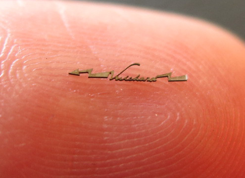 Single part laser micro-cutting